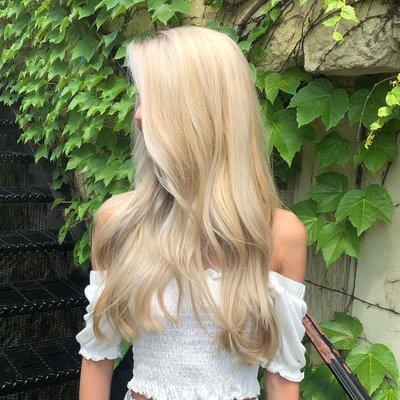 Gorgeous icy blonde cut, color, and style by Jess at our award winning West Dundee salon.