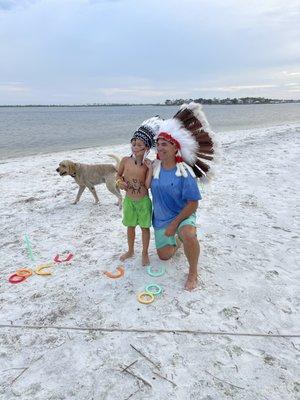 Indian kid at dog island getting his feathers