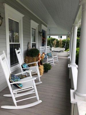 Enjoy the brisk cool weather of fall rocking on the front porch.