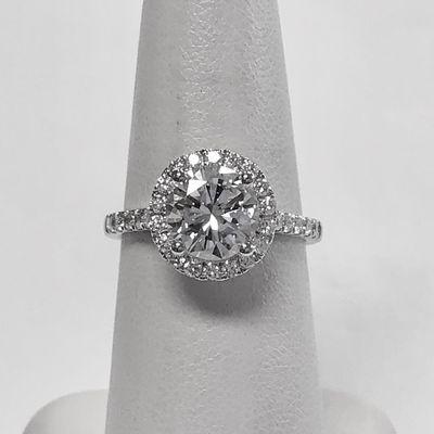 Gorgeous halo diamond engagement ring created for client's 2 ct. center diamond.