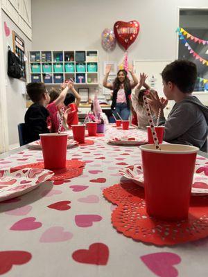 We love to celebrate all the holidays with the students. Here is a picture from one of our Valentines day parties!