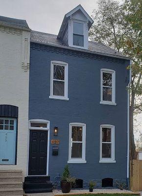 New windows and a fresh coat of paint on a Lancaster City townhouse.