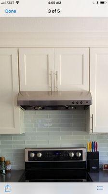 CY-928 Range Hood on white cabinet