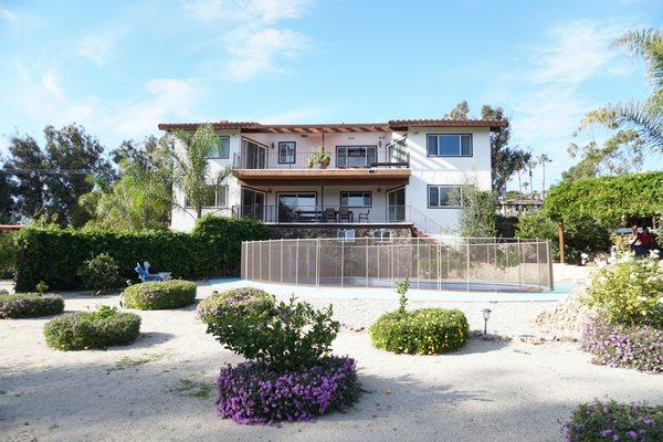 Back of the property with pool