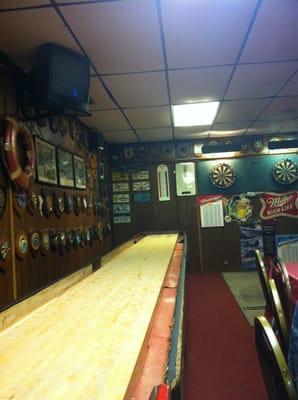 Shuffleboard and dart boards.