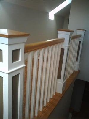 Painted Shaker Box Newels, Red Oak rail and cap with 1 1/4" square balusters.