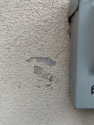 More stucco damage