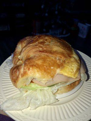 Breakfast turkey and egg croissant sandwich