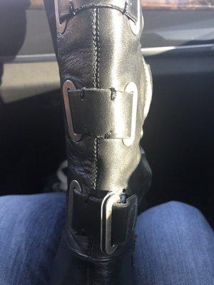 Boot with the faux buckle, I'm taking it home and going to take it with E-6000 glue ..