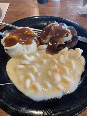 Hamburger steak, mashed potatoes with gravy and Mac and cheese