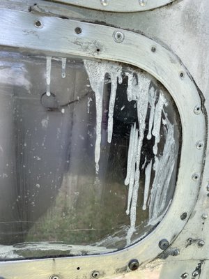 The damaged window before it was replaced