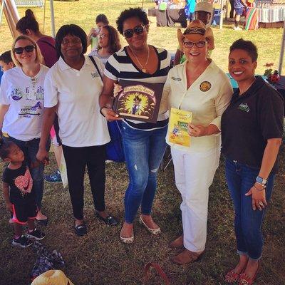 Councilwoman Susan Starkey read a story to the children attending our Reader Rock-A-Thon held at the Town of Davie Orange Blossom Festival.