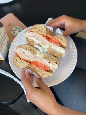 Whole wheat everything bagel (veggie cream cheese, turkey, Swiss and tomatoes)