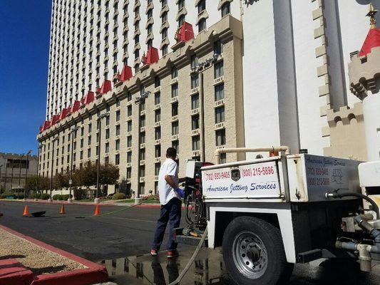 Hydro-jetting a grease line at a casino.