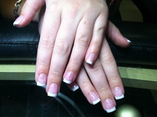 After pic. Full set of pink and white acrylic. Can still see drill marks from other nail tech.