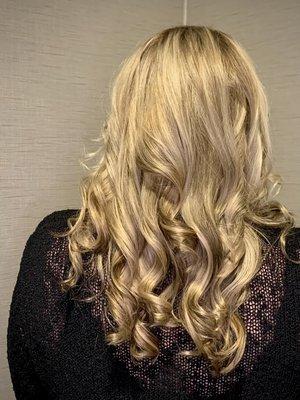 Dimensional blonde in soft white lighting