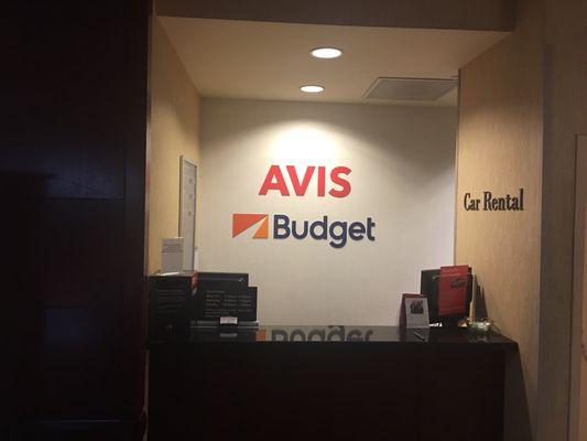 Rental counter inside the Hyatt Regency Hotel lobby