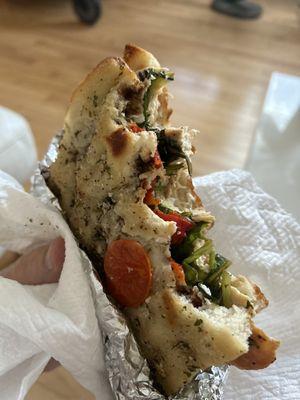 Sorry for bite marks. Lol. it was delicious! Grilled Chicken with Fresh Mozzarella on sundried tomato focaccia Hot