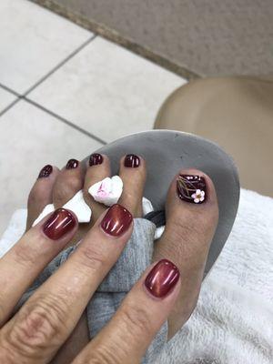 Mani pedi by Lia, beautiful job, magnet on nails to create wave of color, and check out the big toe design, lovely, thank you!