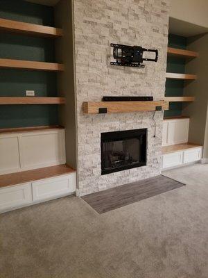 custom built in shelves and fireplace