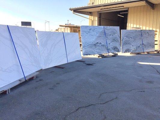 Quartz slabs or granite slabs, come in to our yard and see which one is best to suit your needs.