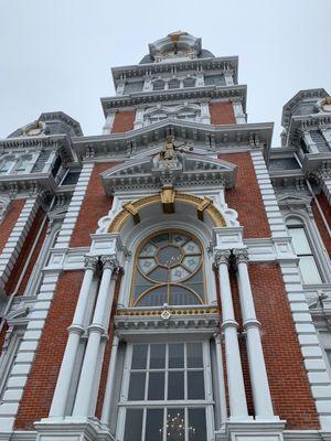 Front of courthouse. Statute of justice can be seen