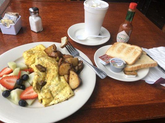 Steak omelette, toast and athol de elote