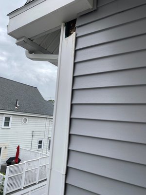 hole in the vinyl siding