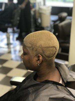 These are just some of EmanuelTheBarber cuts and designs. World Class Cuts specializes in all kinds of designs. Come in today.