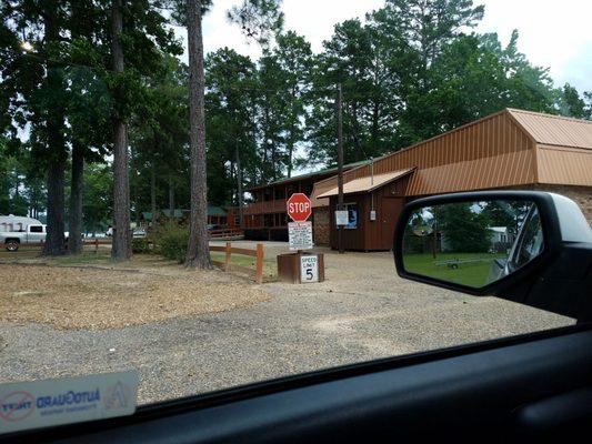 The motel portion behind a closed convenient store