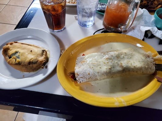 Left: side of chile reyno Right: vegetarian burrito with their rad cheese sauce