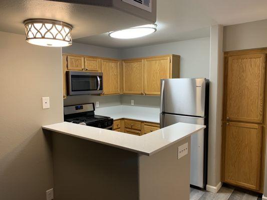 Kitchen small bar area after remodel. New lighting fixtures and all.