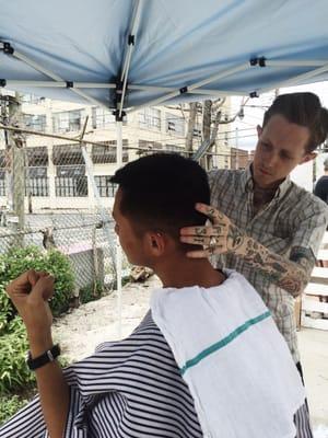 Matthew from Black Rabbit Barbershop cutting hair at the Bushwick Flea this weekend.