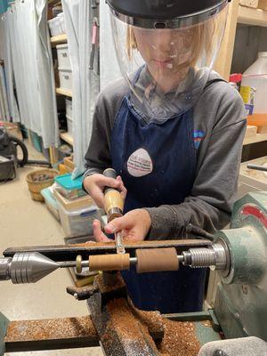 We learn how to turn on a lathe and make pens