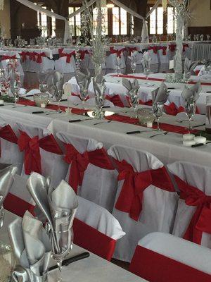 Meadowbrook park ballroom. White covers on metal folding chairs