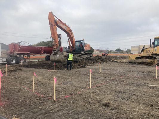 Hauling off dirt at a site development for a Residence Inn.