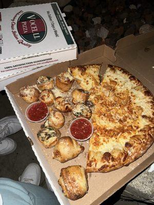 Buffalo chicken pizza, garlic rolls, spinach and mushroom rolls