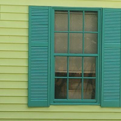 Window frames were dark brown and lifeless and old,we painted same colors as the shutters for beach look