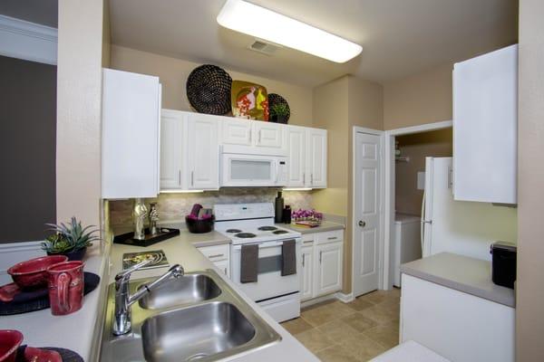 Bright and airy kitchens with mosaic tile backsplash and kitchen pantries