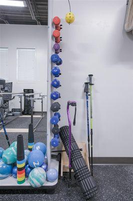 Walking poles, hand weights, balls to name a few of the items used at our clinic.