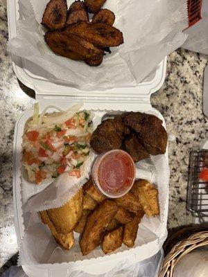 Chicharones, yucca, salad, sauce, and a side of sweet plantains :)