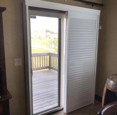 Shutters for a sliding door