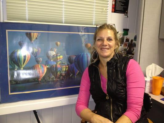 Victoria Linssen, posing next to the hot air balloons she used to crew for when younger.