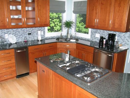 Impala Black granite kitchen with tile backsplash