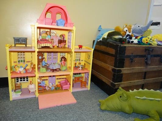 The doll house is a tool to assist children in expressing their thoughts and feelings about relationships and situations.