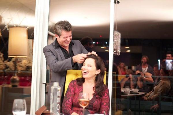 LOUIS FROM  LOUIS DE CHIARRO , TOUCHING UP  ACTRESS FRAN DRESHNER'S HAIR  FOR A FUNDRAISER  SHE ATTENDED.