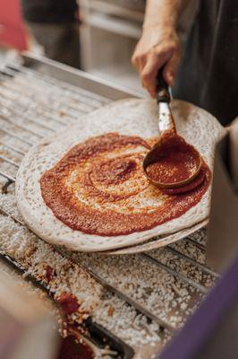 Our pizzas roll out fresh and made to order!