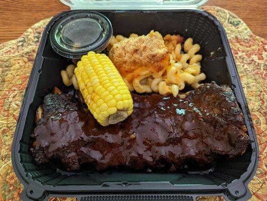 Half rack of ribs, Mac and cheese, and corn