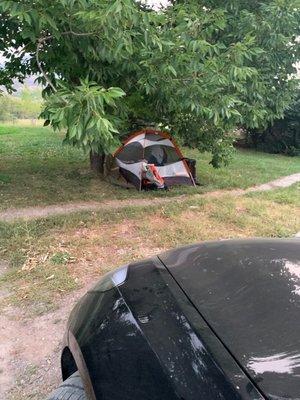 My friend camping in her tent outside the diner