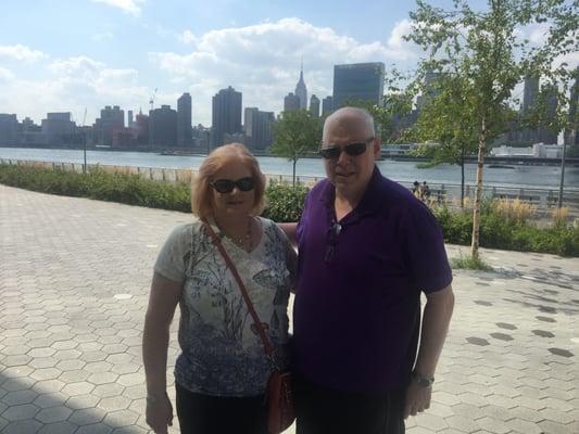 The East River from the Queens side. Beautiful view of the UN and Emoore State Buildingp